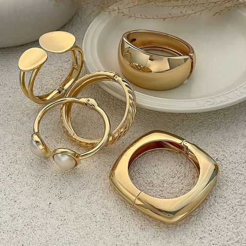 GILDED STATEMENT Bangle Set GILDED STATEMENT Bangle Set
