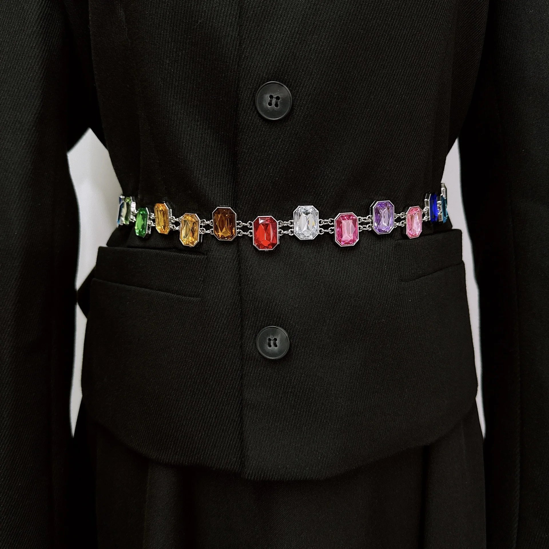 Black coat with a colorful gemstone belt Black coat with a colorful gemstone belt