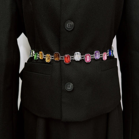 Black coat with a colorful gemstone belt Black coat with a colorful gemstone belt