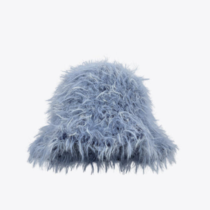 Blue fuzzy beanie on a white background Blue fuzzy beanie on a white background