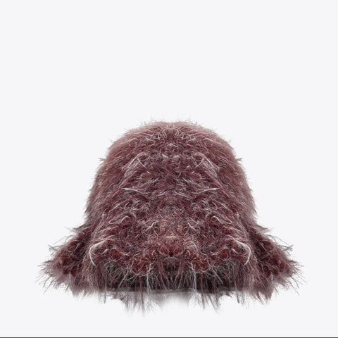 Fluffy pink hat on a white background Fluffy pink hat on a white background